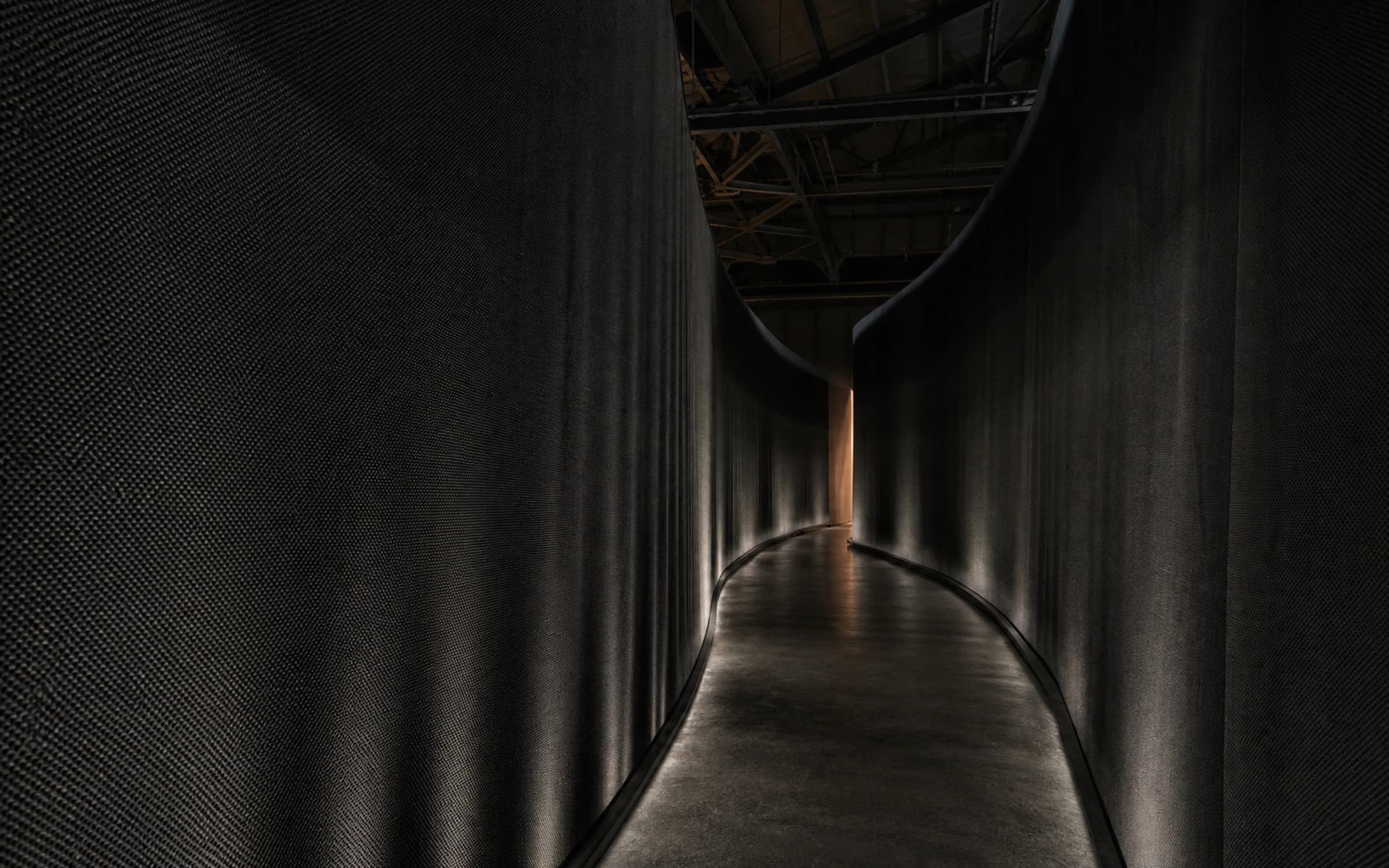 Looped corridor interior of Echo Loop with reflected light