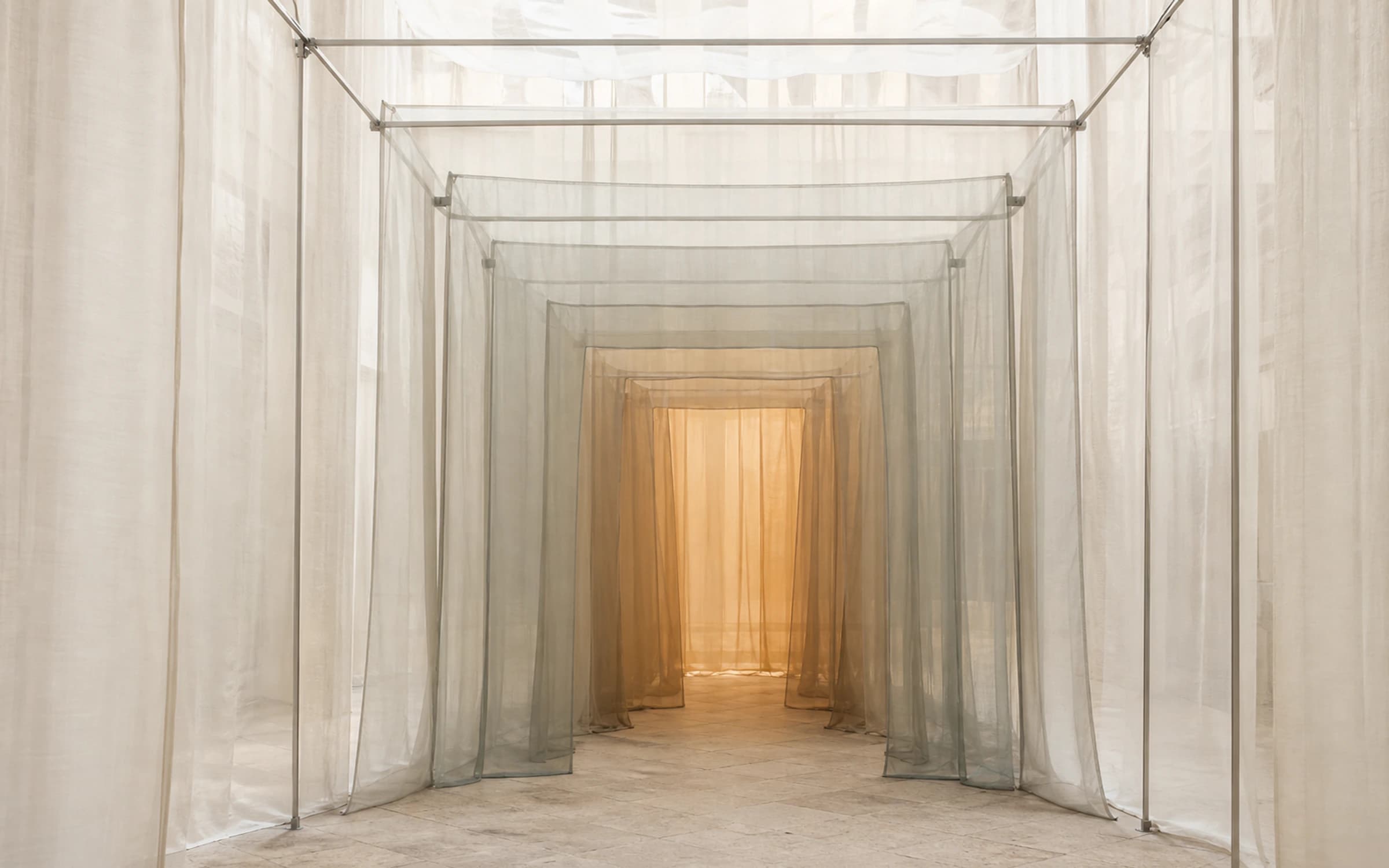 Layered translucent textile veils of Veil Chamber